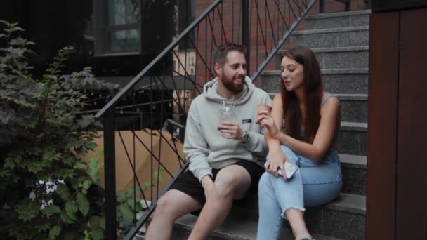 Good Looking Positive Young Woman Man Sitting Steps Outdoors Freelancer — Stockvideo