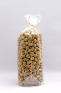 green peas in basket, isolated on white background