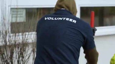 Volunteer working in hoodies and a shirt