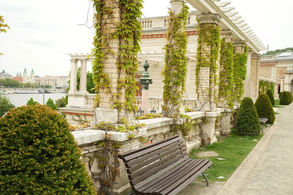 Beautiful city landscape behind an empty bench