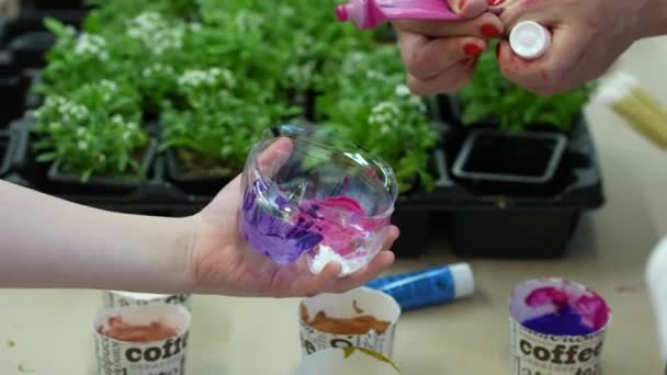 Teacher Hands Squeezing Paint Tube Out Bowl Held Pupil — Stockvideo