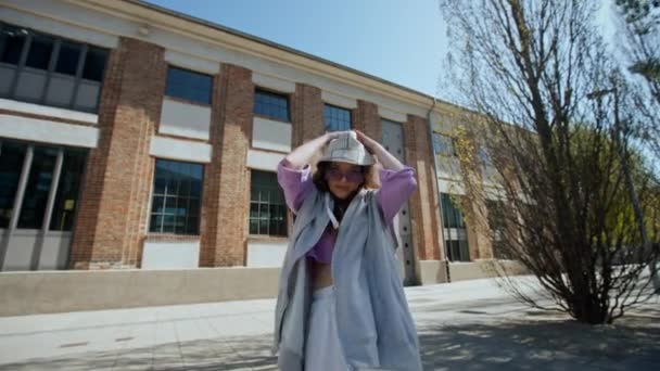 Closeup girl staring at camera. Portrait of charming female person dancing on the street — Video Stock