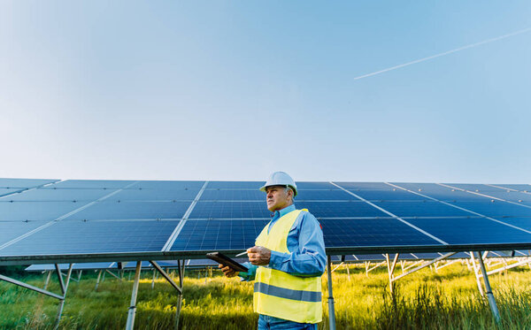 Solar Engineer Checking Photovoltaic Panels Solar Farm Cover Photo High Stock Picture