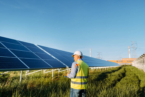 Engineer Standing Front Solar Panels Eco Energy Concept High Quality Stock Image
