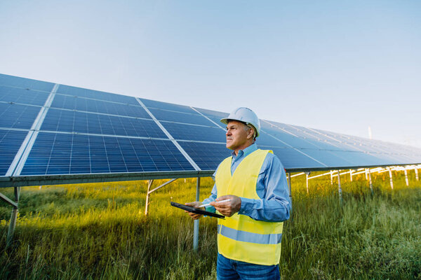 Solar Engineer Working Digital Tablet Renewable Energy Farm Alternative Eco Stock Photo