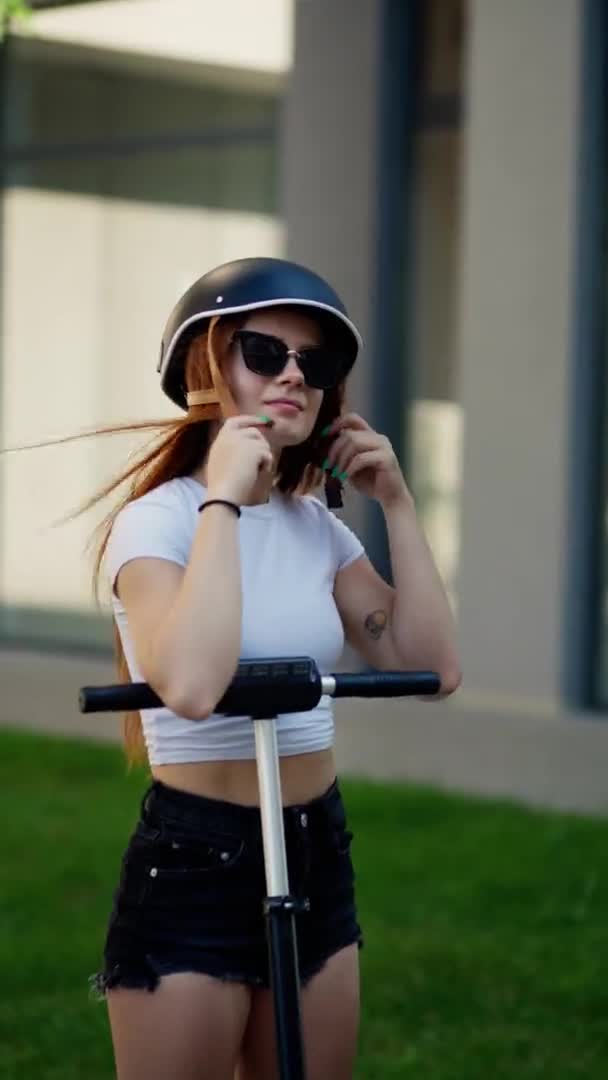Cute Ginger Woman Fastening Helmet Riding Electric Scooter Road Transport — Wideo stockowe