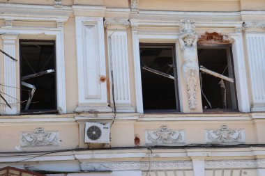 Broken windows in the historical building in Kharkiv after shelling by the Russian army
