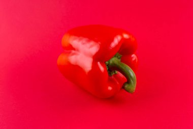 Paprika. Pepper red. Bell pepper isolated on red background . Sweet red pepper. With clipping path. Full depth of field