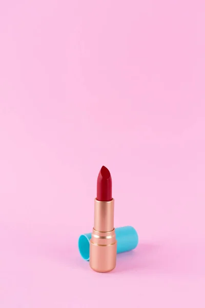 Red Lipstick Golden Tube Isolated Pink Background Cosmetic Product Bright — Stock Fotó