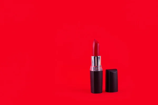 Red Lipstick Isolated Red Background Make Gloss Black Case Monochrome —  Fotos de Stock