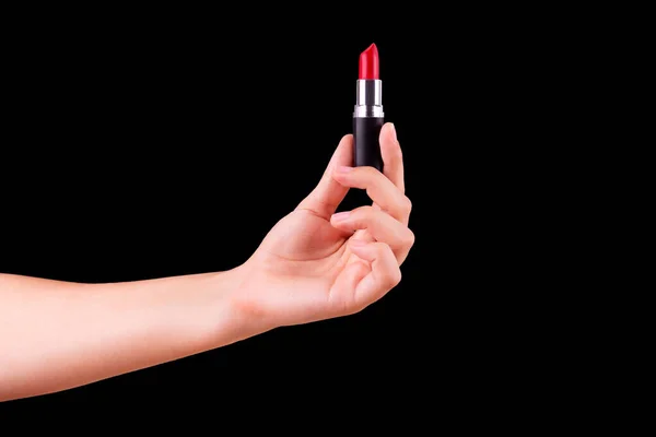 Female Hand Holding Red Lipstick Isolated Black Background Equipment Maquillage — Stockfoto