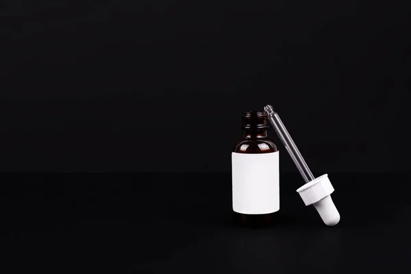Dropper Brown Bottle Cosmetic Serum Glass Pipette Isolated Black Background — 스톡 사진
