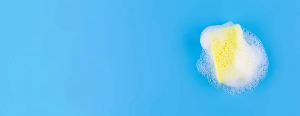 Cleaning Yellow Sponge Soapy Bubble Foam Blue Background Cleaning Concept — ストック写真