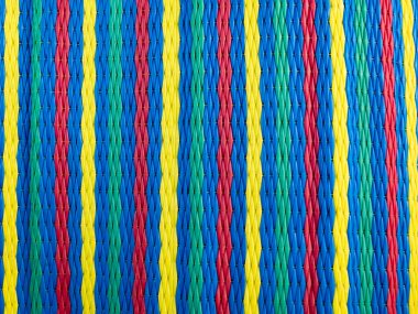 The surface, weaving work of Asian people, many colors, used to make mats, try to sit in patterns that represent the culture of each area.