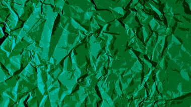 Yeşil sanat kağıdının arka planı kırışmış, ışık ve gölgelerle kaba bir doku oluşturuyor..
