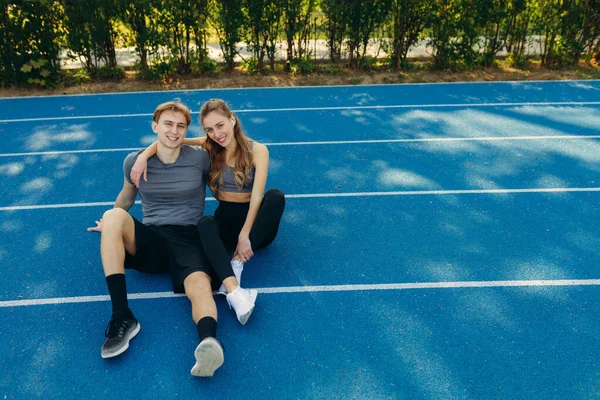 Couple Doing Sport Together Stadium Having Rest Morning Run — Fotografia de Stock