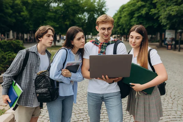 Young People Looking Laptop Together — Foto de Stock
