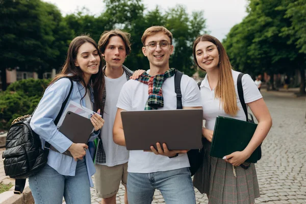Young People Looking Laptop Together — Stockfoto