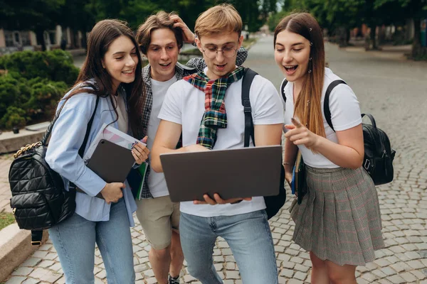 Young People Looking Laptop Together — Stockfoto