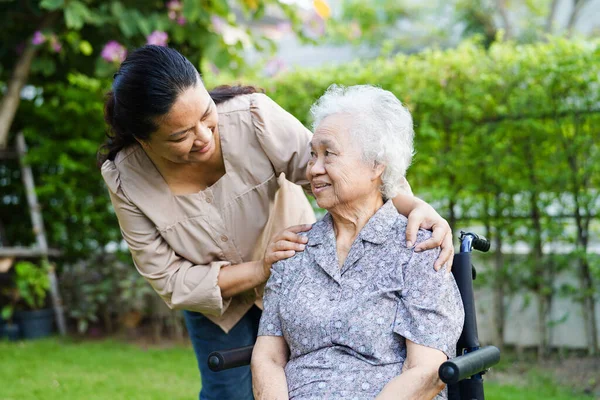 Caregiver Help Asian Elderly Woman Disability Patient Sitting Wheelchair Park — Stock Photo, Image