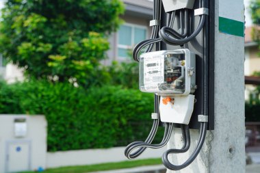 Bangkok, Thailand - May 15, 2022 Electric measuring power meter for energy cost at home and office.