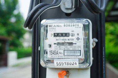Bangkok, Thailand - May 15, 2022 Electric measuring power meter for energy cost at home and office.