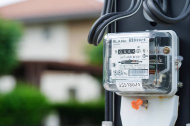 Bangkok, Thailand - May 15, 2022 Electric measuring power meter for energy cost at home and office.