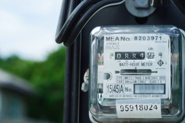 Bangkok, Thailand - May 15, 2022 Electric measuring power meter for energy cost at home and office.