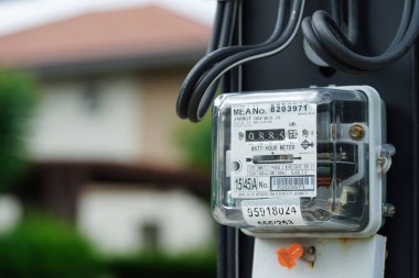 Bangkok, Thailand - May 15, 2022 Electric measuring power meter for energy cost at home and office.