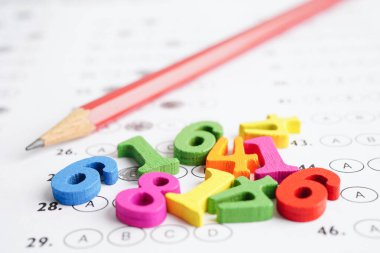 Math number with pencil on answer sheet test choice for learning Mathematic, education math concept.