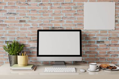 Laptop beyaz ekranlı tavan arası çalışma alanı ve masada kahve ve kahvaltı..