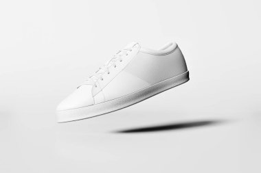 Beyaz arka planda beyaz ayakkabılar. Minimum konsept fikir. 3B görüntüleme.