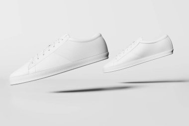 Beyaz arka planda beyaz ayakkabılar. Minimum konsept fikir. 3B görüntüleme.