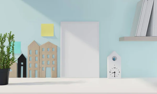 Masanın üzerinde mavi duvar arkaplanı olan boş fotoğraf çerçevesi.