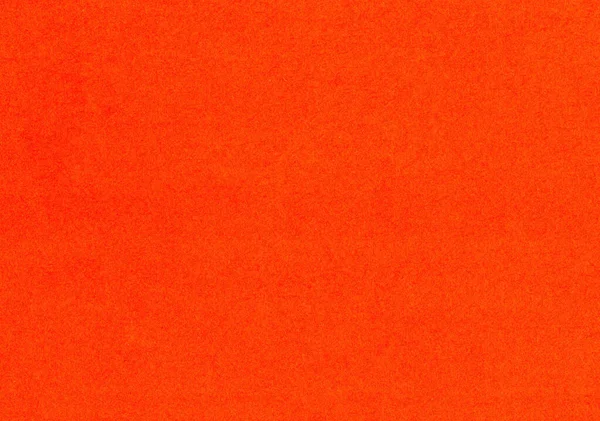 Kaliteli bir tohum lifinin yüksek kaliteli taraması pürüzsüz kaplanmamış kağıt dokusu kırmızı, parlak, neon turuncu arkaplan fotokopi alanı ile duvar kağıtları için maket malzemesi