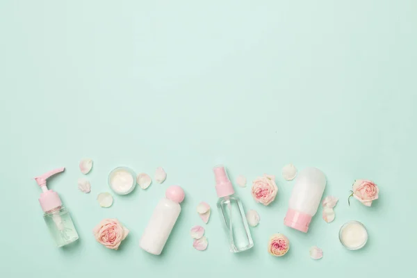 Set Small Cosmetic Bottles Color Background Top View — Stockfoto