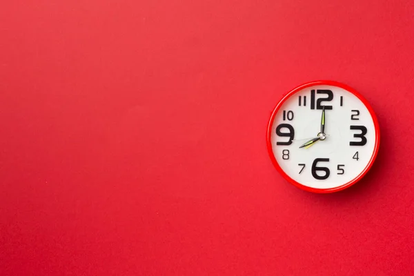 Red Alarm Clock Color Background Top View — стоковое фото