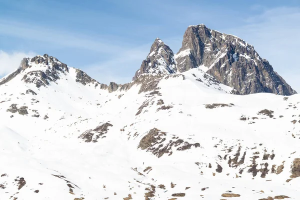 View of Pic du Midi d'Ossau snowy. Famous  ski touring destination in french pyrenees.