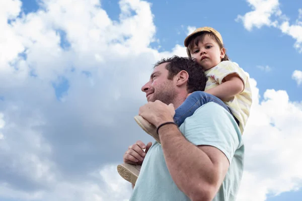 Low Angle View Little Girl Sitting Her Father Shoulders Looking — Stock Photo, Image