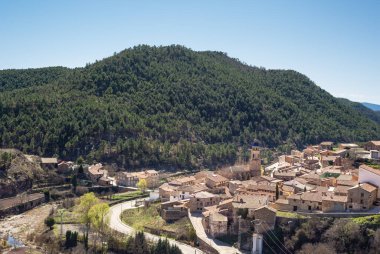 General view of Cabra de Mora a small and picturesque village of Teruel province, Spain, located in the mountains and surrounded of leafy pine forest.