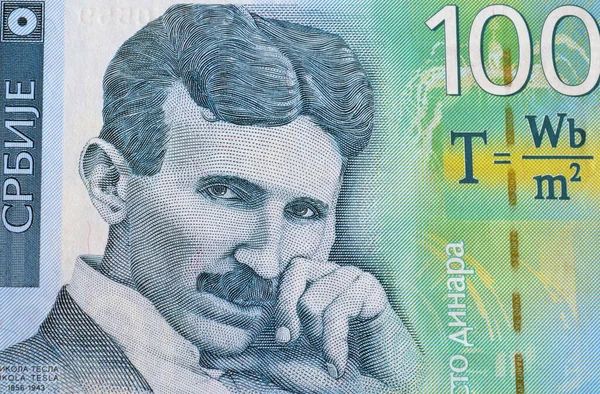 stock image Close up of Obverse of uncirculated 100 dinars paper bill issued by Serbia, that shows portrait of scientist Nikola Tesla