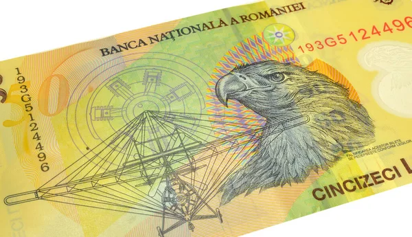 Romanya tarafından basılmış 50 lei banknotunun tersi, Vlaicu II uçak tasarımı, bir kartal kafası, bir uçak motoru çizimi