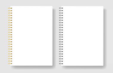 Metal yaylı defterler beyaz arkaplanda izole edilmiş