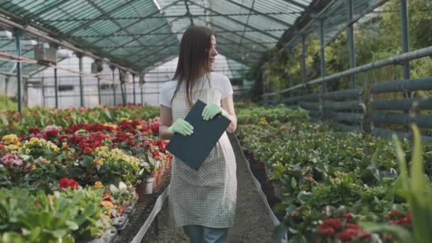Smart Young Asian Girl Florist Checks Quality Plants Greenhouse Tablet — Stock Video