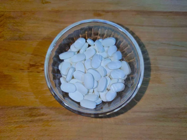 Comprims blanc fond bois