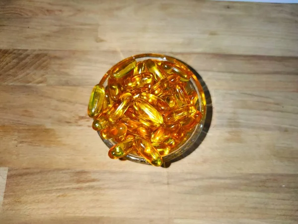 Gelule omega fond bois