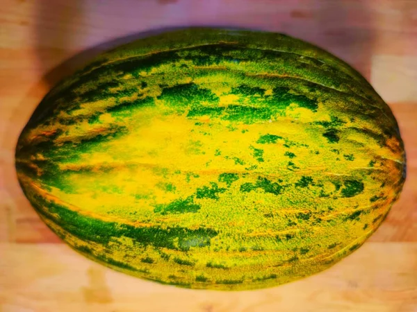 Melon vert sur fond en bois