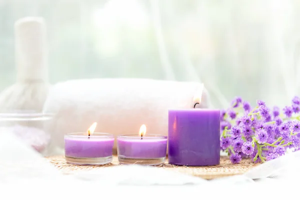 Spa beauty massage health wellness background. Spa Thai therapy treatment aromatherapy for body woman with purple flower nature candle for relax and summer time. Lifestyle Health Concept