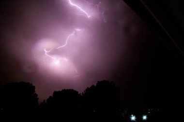 lightning storm, summer storm, lightning and thunder in purple colors