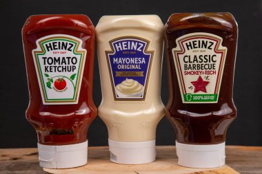 Ketchup, barbecue sauce and mayonnaise, Heinz brand, black backg
